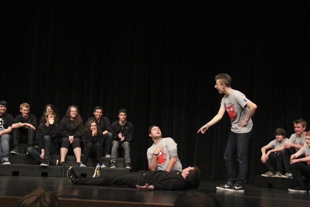 Bryan Wilson and Myles Stillwaugh, along with a member of the Inglemoor team, deliver a hilarious performance during one of the theater sports events.