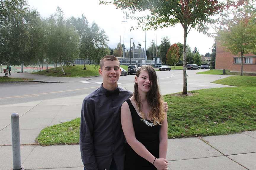 Freshmen Jessica Gable and Paul Pratt dress for success, dressed in formal attire.