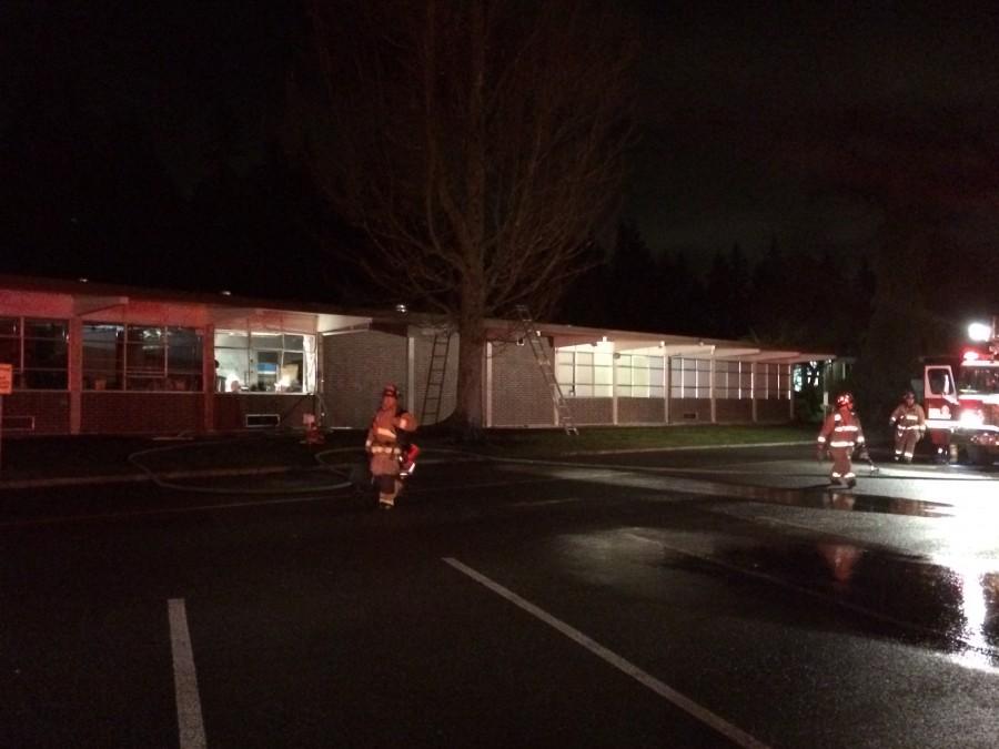 Firefighters continue to survey Madrona K-8 after putting out the fire.