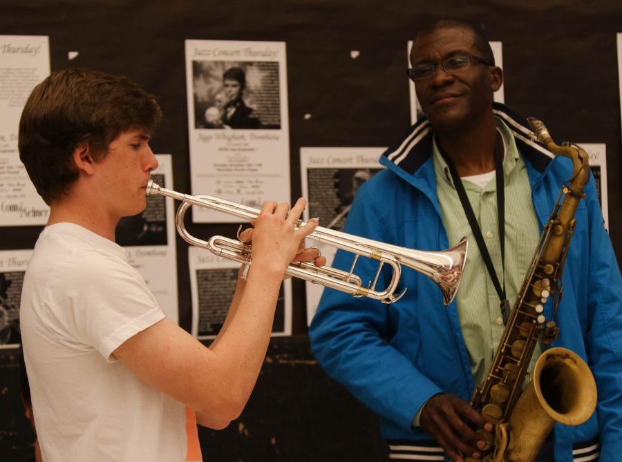 Williams works with Finn OHea to improve his soloing skills during an energetic number in the second half of the clinic.