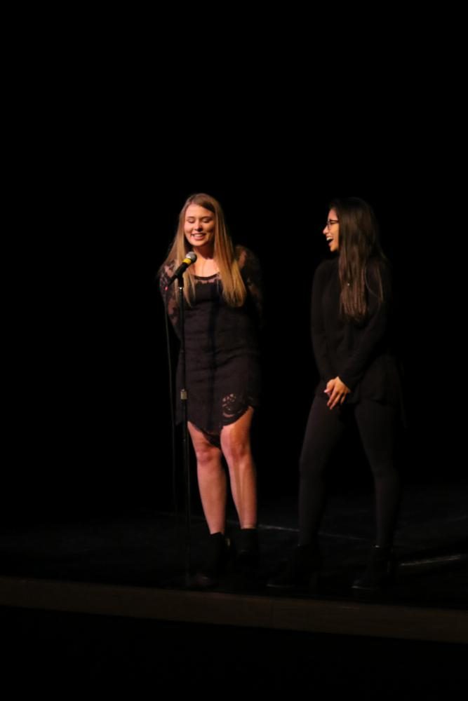 Announcers Maddie Powers and Karina Gonzalez, both MTHS seniors, introduce the next act.