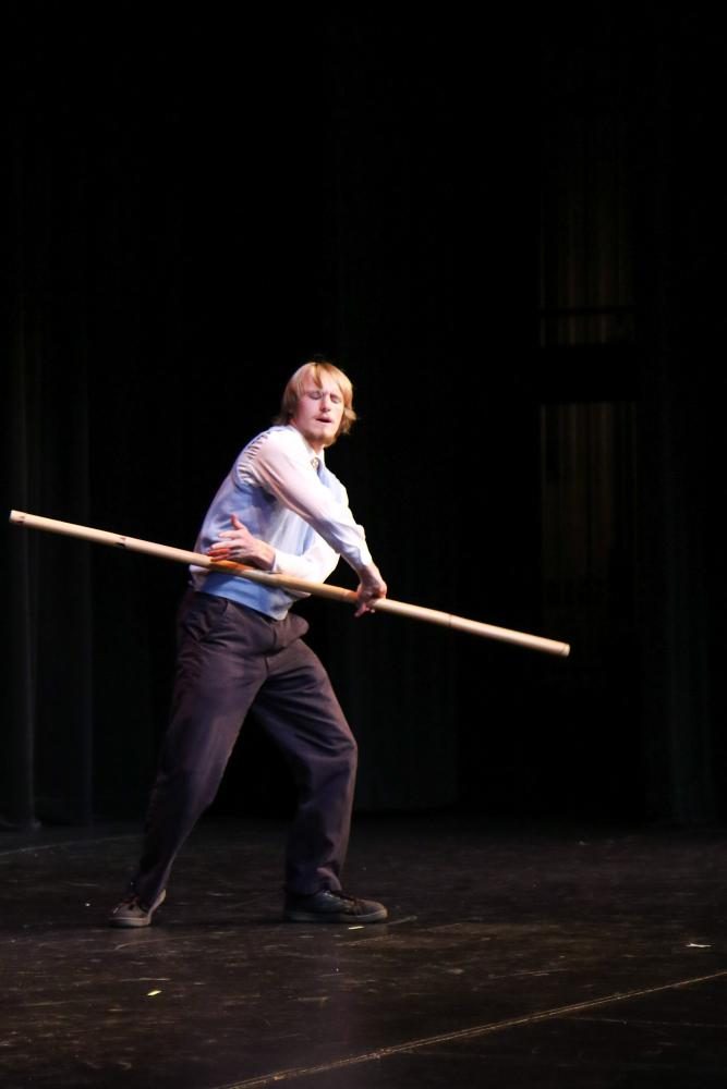 Senior Nathan Reeber uses his bow-staff in the second part of his performance.
