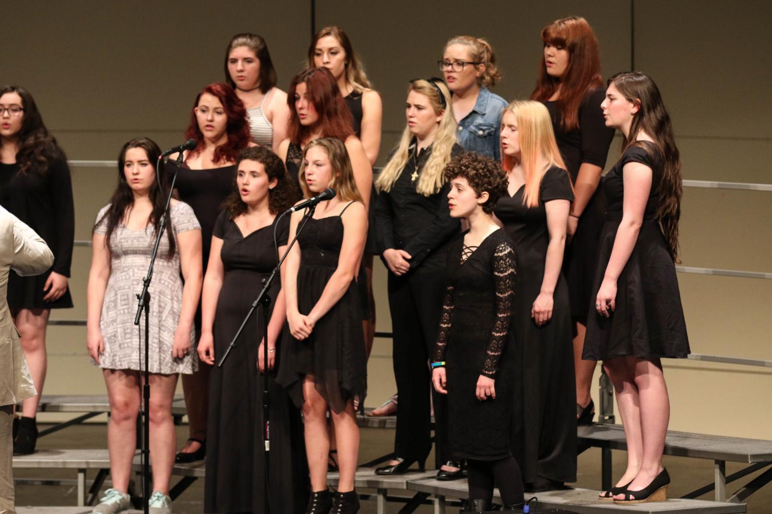 Members of the all combined Chamber and Accents Choir group give an elegant performance of when it was yet dark at their final concert of the year.