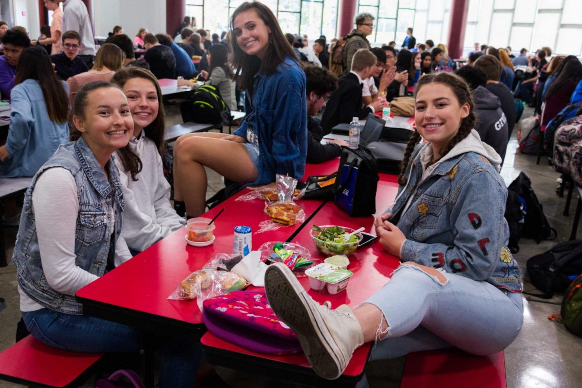 Students show off their spirited outfits during lunch on Monday.
