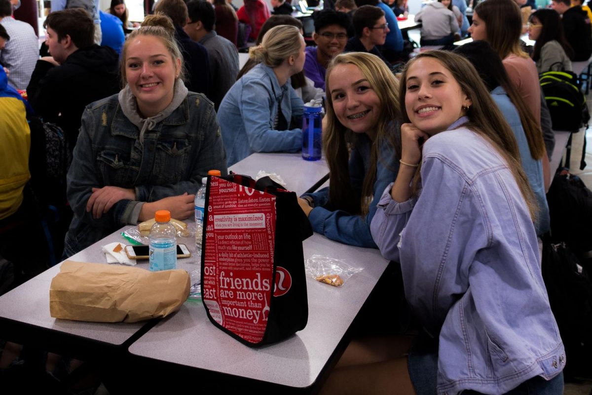 Students flash their smiles for Denim Day.