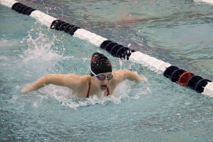 Hawks Swimmer intensely swims her way through her event