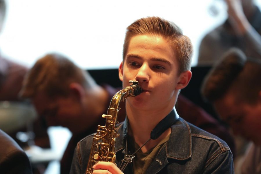 Sophomore Owen Moreland contributes to Harlem Congo with the saxophone.