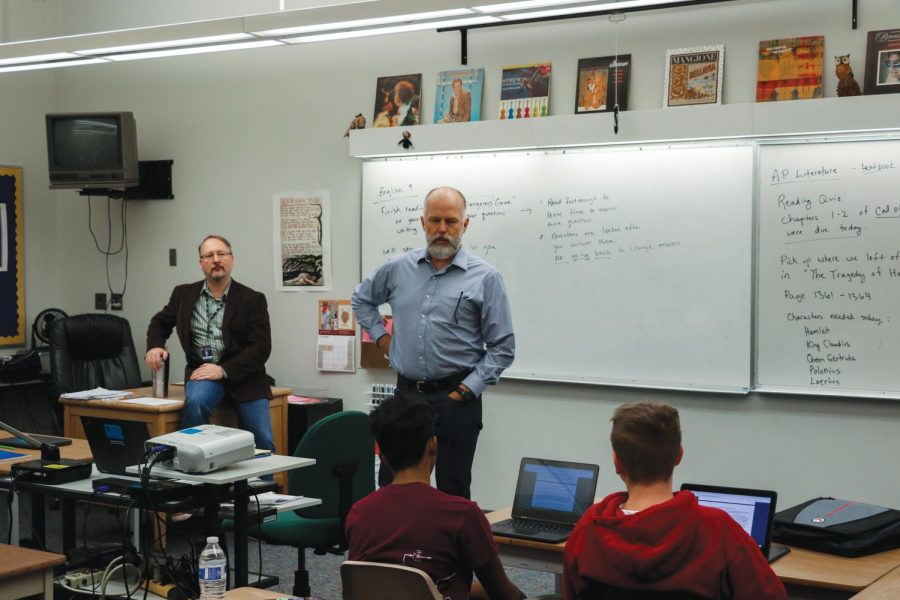 Assistant Principal Dan Falk informs Robert Reichles third period English 9 class of impending schedule changes. Reichle also had his first period AP Literature class affected as one of the six cut in the face of lower-than-expected attendance numbers.