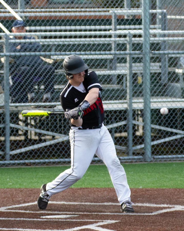 Sophomore Ethan Dunne bats against Interlake