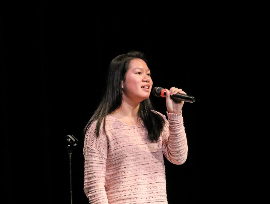 With a smile, freshman Anabelle Sumera-Decoret sings Just The Way You Are by Bruno Mars at Terrace Idol Round Two.