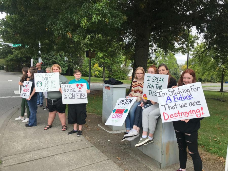 Students demonstrating on 44th Ave during the Global Climate Strike. The signs were designed by the students before the protest began at noon. 