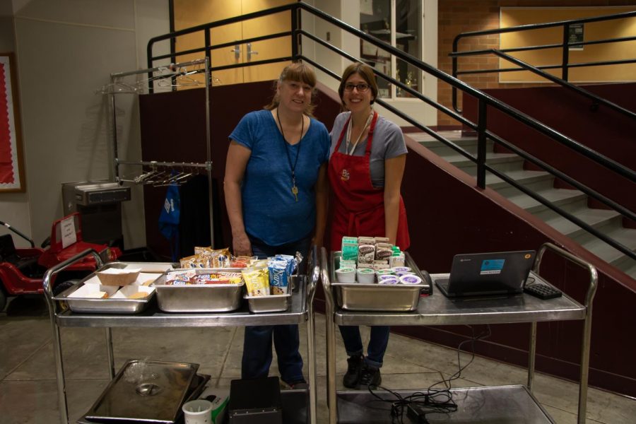 Barb+Green+and+Elettra+Paparella+are+seen+giving+out+breakfast+to+students+during+every+nutrition+break.+They+operate+the+new+service+cart+on+the+second+floor+by+the+theater.+