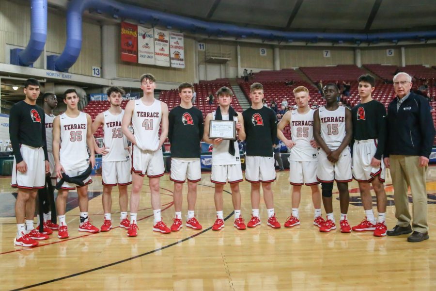 The Hawks accept the 2019-2020 Academic All State Championship certificate for 2A winter sports following the tough loss Wednesday night.