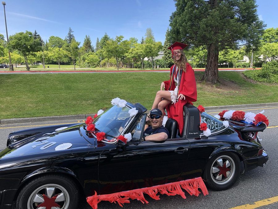 Isabel Ong, one of this years valedictorians, is delivered in style to the 2020 Virtual Graduation by her family in a Porsche convertible. 