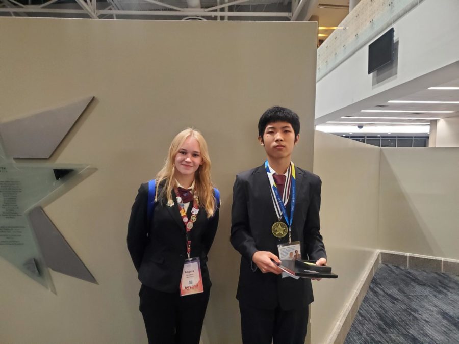 Junior+Angela+Grachev+%28left%29+and+sophomore+Chengxuan+Li+%28right%29+posing+during+the+international+HOSA+conference+after+Li+won+the+first+place+award+in+Biotechnology.