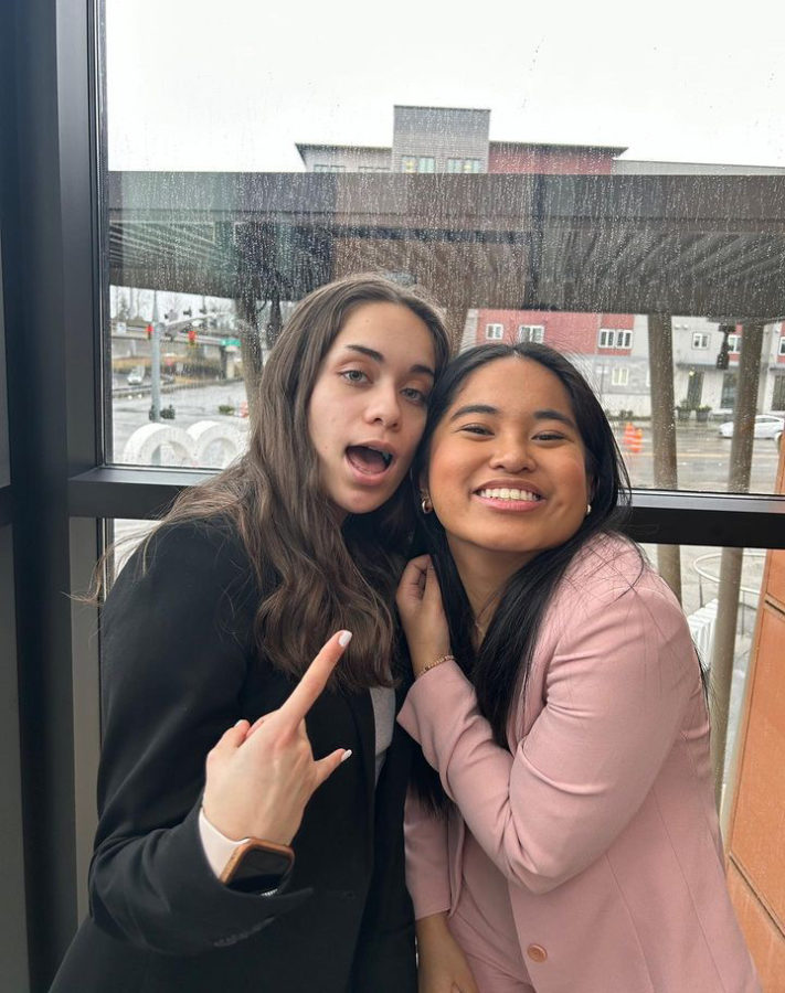 Kayla Apostol and friend Liliana Lopez-Santiago at a DECA conference.