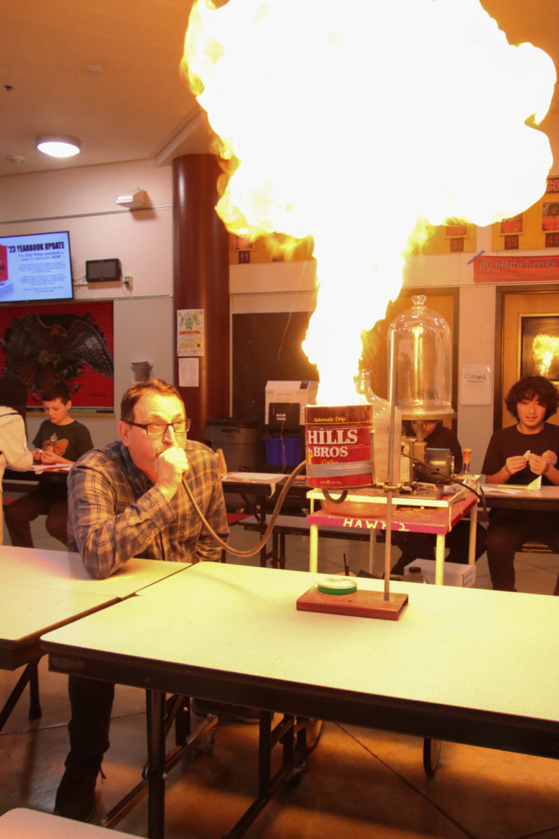 Chemistry teacher John Traxler presenting an explosive experiment. This experiment can also be seen in the MTHS Lip Sync video from 2018.