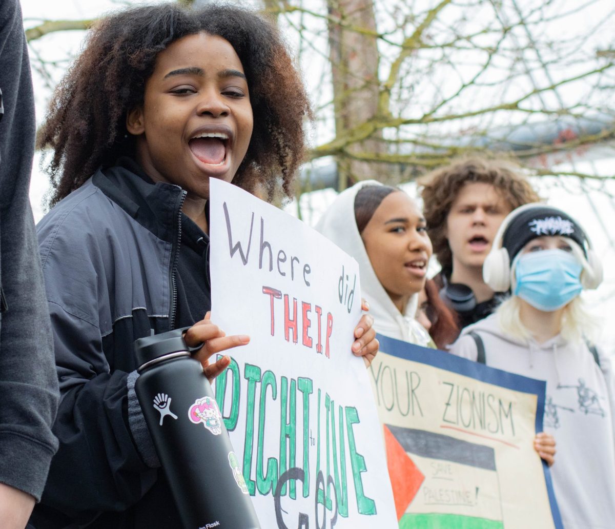 Senior Samira Udeogu holds up a sign saying Where did their [Palestinians] right to live go? 