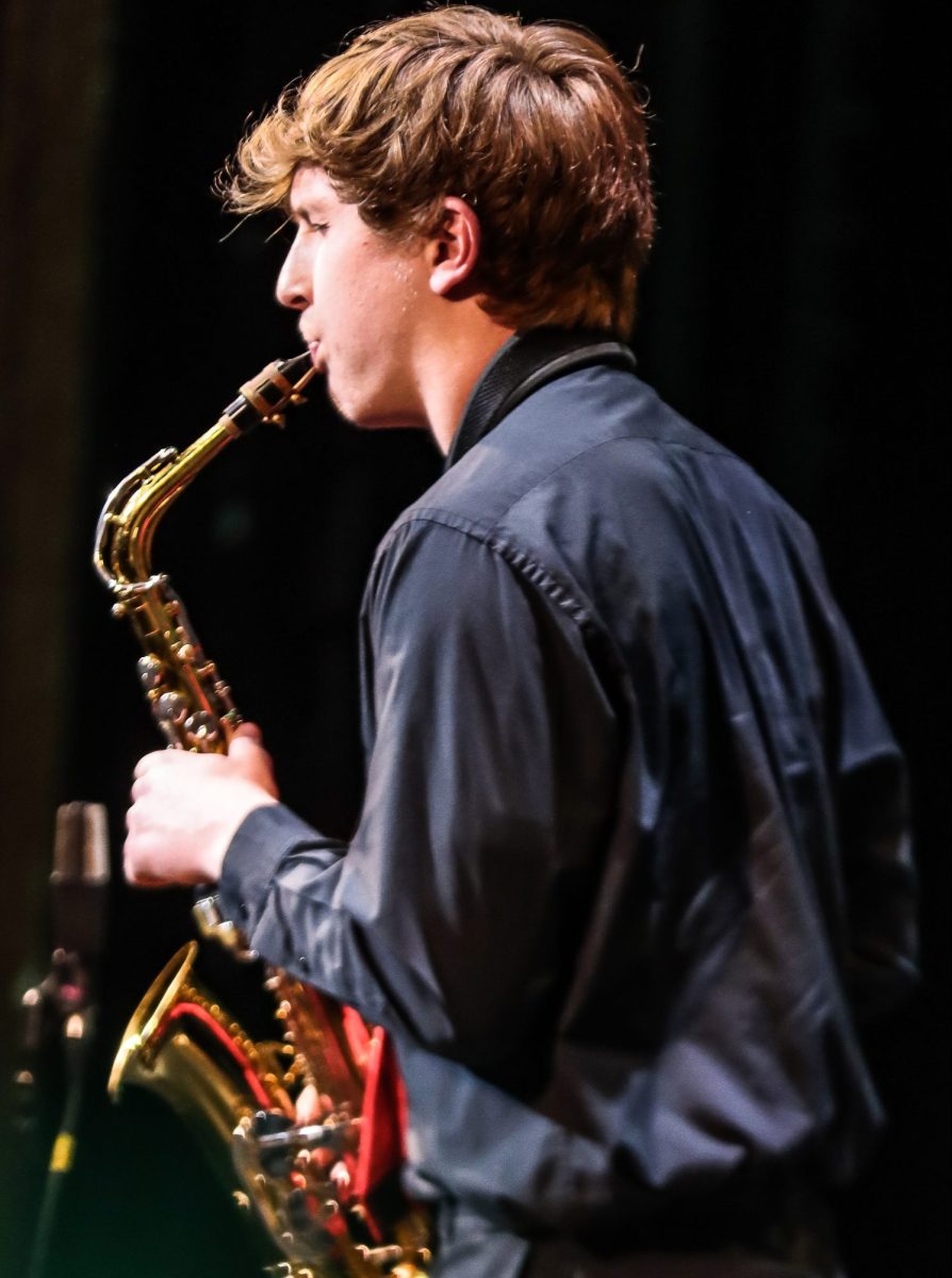 Sophomore+Travis+Herberg+performs+his+saxophone+solo+during+A+Little+Minor+Booze+at+the+Hot+Java+Cool+Jazz+concert+in+March.