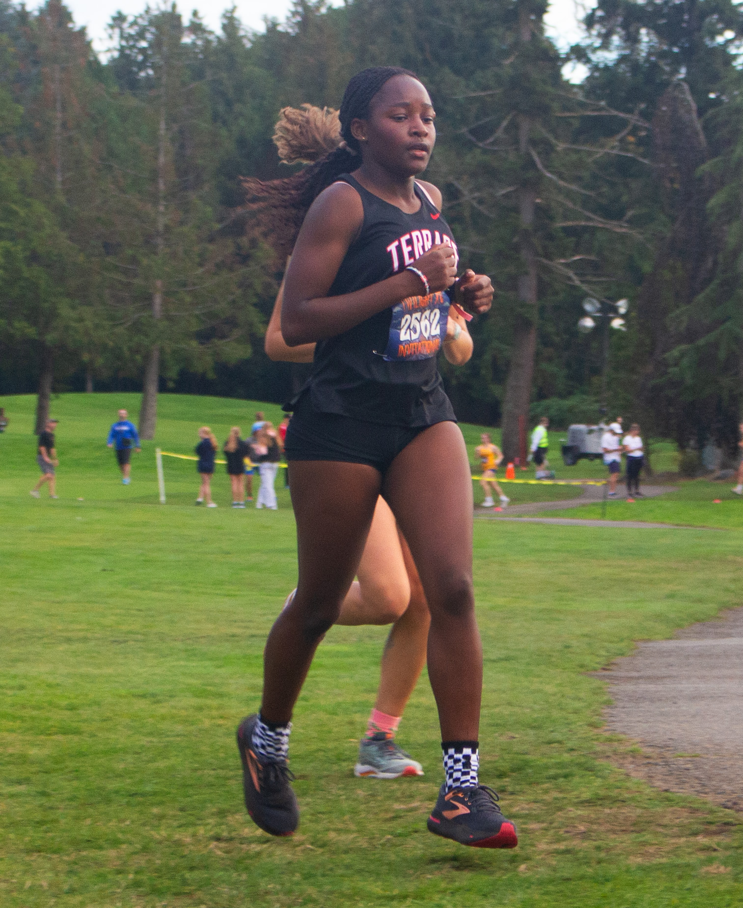 Junior Rosechelle Obare making her way through Twilight XC Invitational meet, hosted by Marysville Getchell High School on Oct. 5.