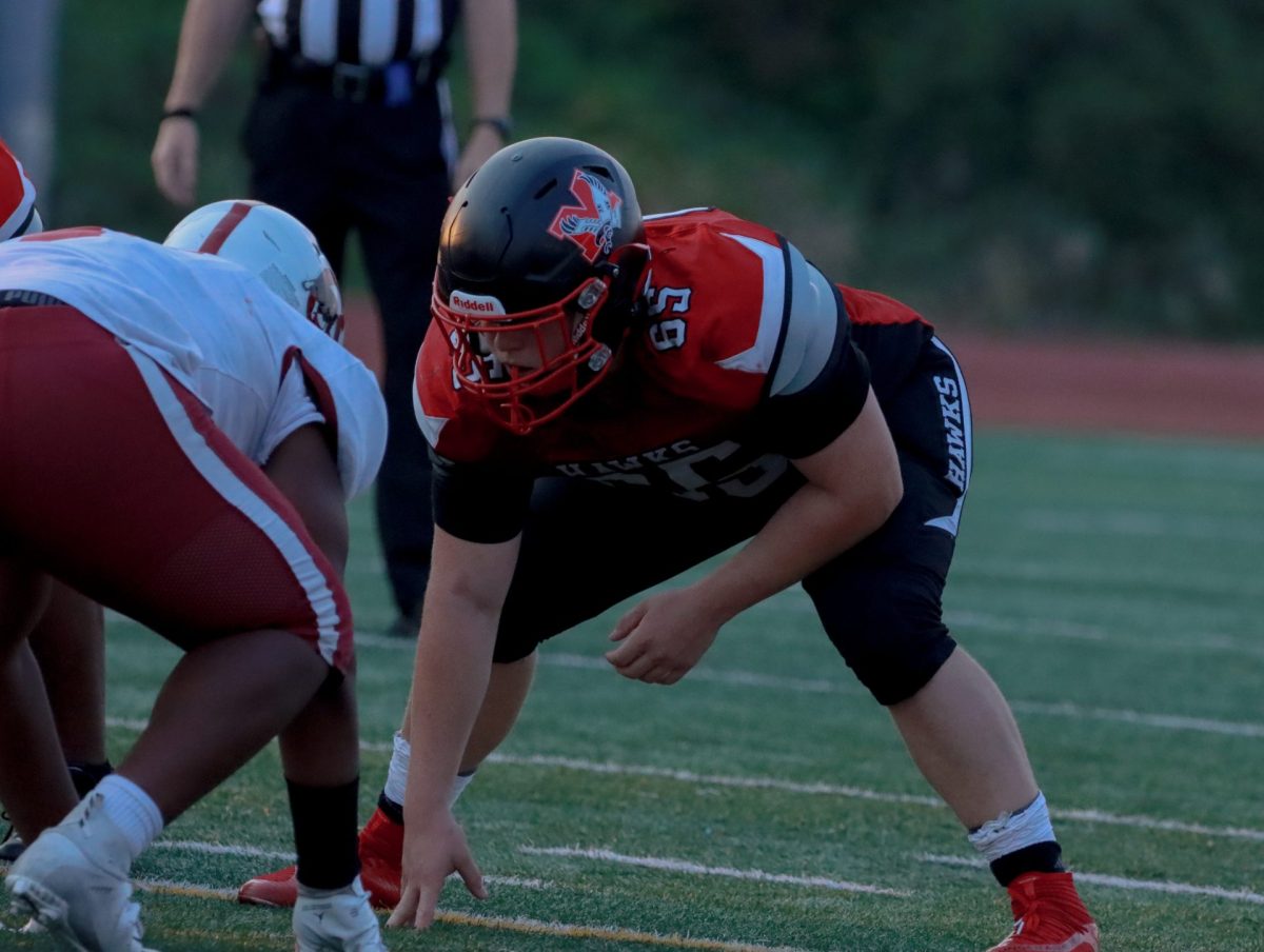 Senior Elijah Swett prepares for a play during the Terrace and Cascade High School game on Sept. 6 at Edmonds Stadium.