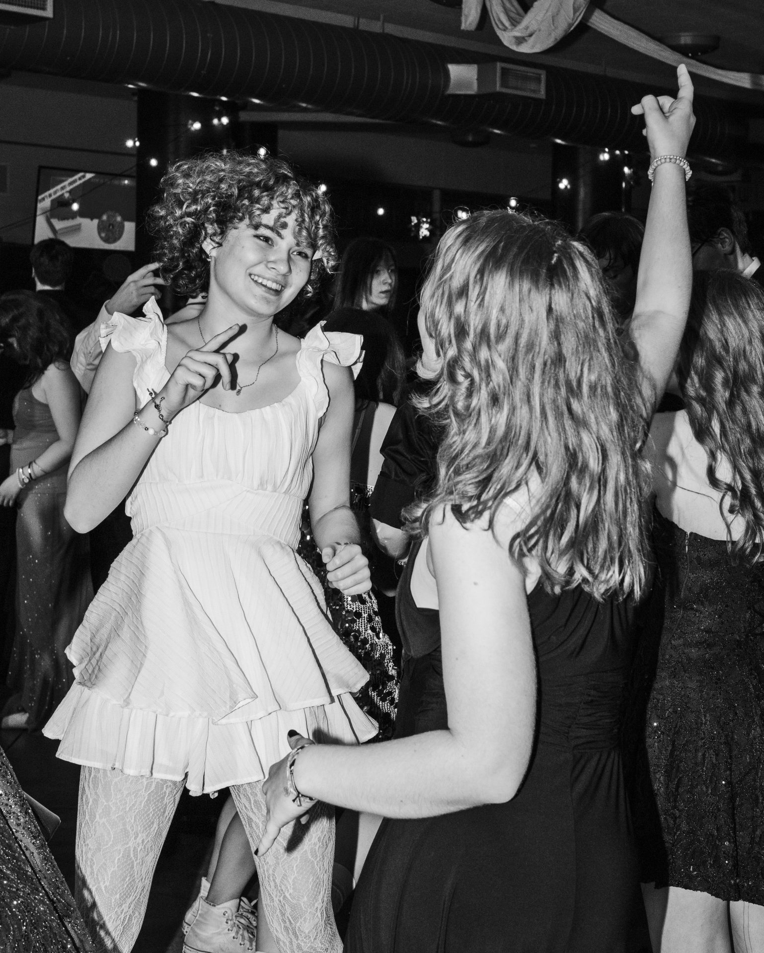 Students Sophie Ionitsa & Penelope Crowell dance together at the Winter Ball Jan. 31.
